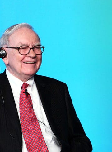 Warren Buffett with a gradient blue background