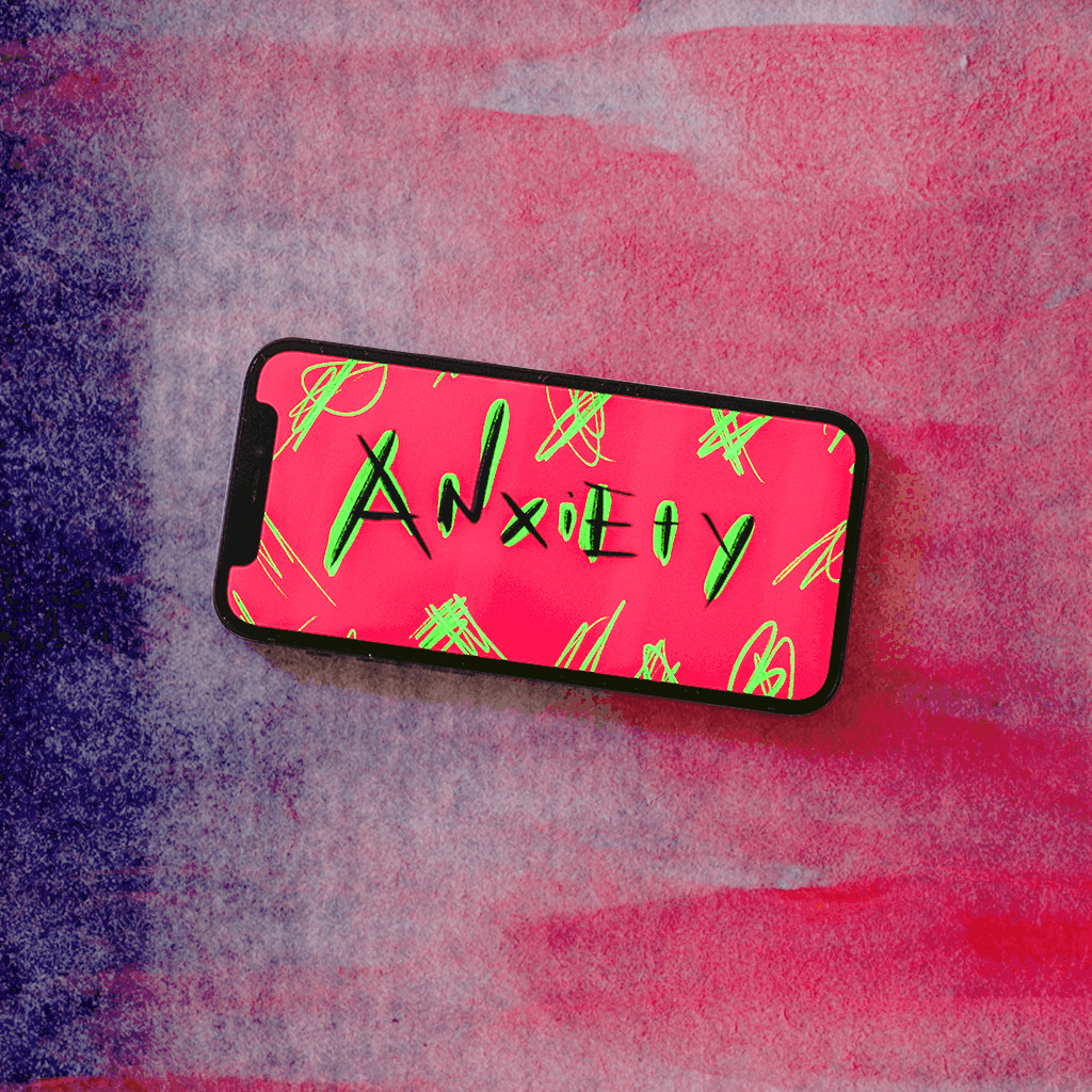 cell phone with the word "Anxiety"
