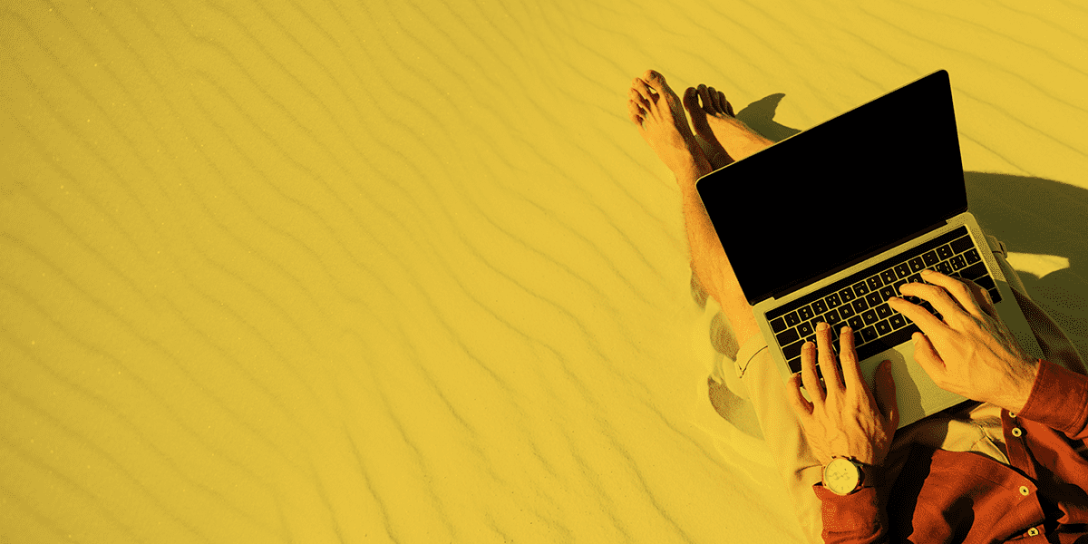 digital nomad working on a laptop